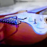 Gitara elektryczna – jak zacząć przygodę z najważniejszym instrumentem rocka?
